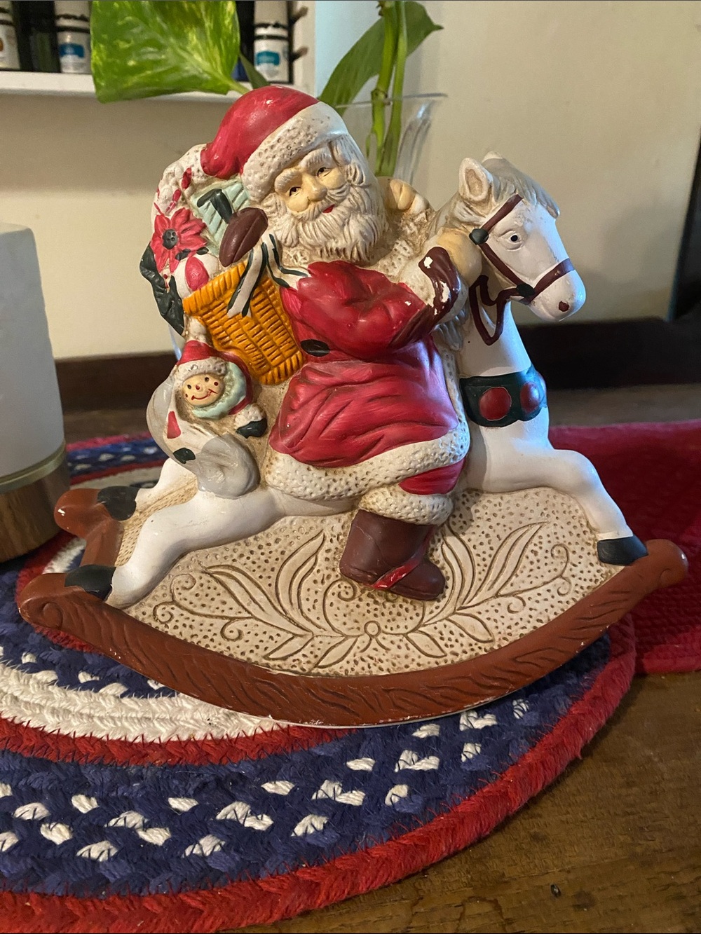 Holiday Santa on Rocking Horse Figurine